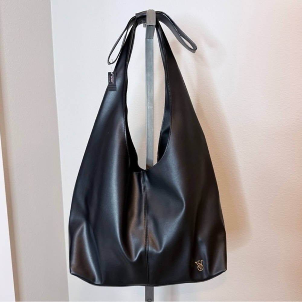 NWT Victoria’s Secret black faux leather hobo bag with bow detail